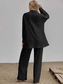 Conjunto camisa larga bajo con abertura con pantalones de pierna ancha - Negro - Ver 2