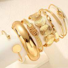 Juego de 7 piezas de brazaletes tipo bangle con hojas lisas de estilo europeo y americano, conjunto de joyas de brazalete abierto con rayas asimétricas - Amarillo Oro - Ver 2