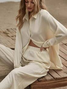 Conjunto camisa larga bajo con abertura con pantalones de pierna ancha - Beis - Ver 1