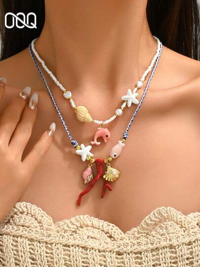 1 chiếc vòng cổ mặt dây chuyền hình sao biển, vỏ sò, cá hai lớp kiểu dáng nghỉ hè, vòng cổ đính hạt thời trang cho tiệc bãi biển, kỳ nghỉ, du lịch, làm thủ công, màu sắc và số lượng hạt cườm được chọn ngẫu nhiên.