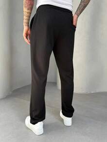 Pantalón casual de ajuste relajado con cordón para hombres - Negro - Ver 5