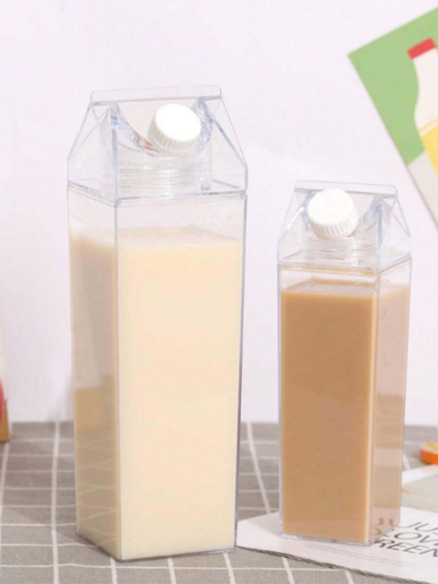 1 chai nước uống bằng nhựa trong suốt hình hộp sữa, có nắp chống rò rỉ, tiện dụng, thích hợp đựng sữa, sinh tố và các loại đồ uống khác.