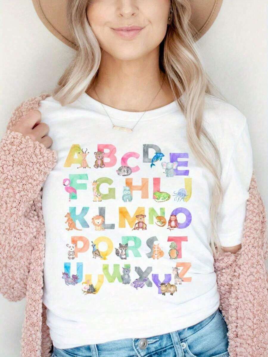1 pieza de ropa para educadores - Camisa de maestro con letras del alfabeto y bonitos patrones de animales sobre fondo negro - Adecuada para jardín de infantes, preescolar, guardería y escuela primaria - Lavable a máquina - Regalo de cumpleaños - Colección de regreso a clases, disfraz de maestro, material suave, diseño divertido, exclusivo para maestros de preescolar - 180g 100% algodón suave - L Blanco - Ver 1