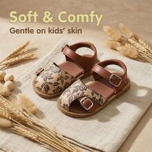 一双时尚百搭的儿童平底凉鞋，采用花卉图案和纯色设计，配有可调节绑带。鞋底柔软舒适，适合海滩旅行和日常玩耍。 - 棕色 - 查看 6