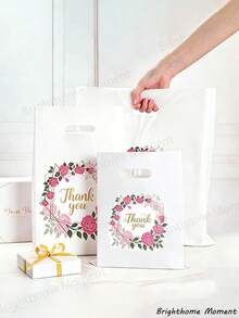 Túi quà cảm ơn họa tiết hoa, túi quà nhựa màu trắng với chữ "Cảm ơn" in nhũ vàng, có 3 kích cỡ, có thể tái sử dụng, nhựa trong suốt, có khóa kéo, thích hợp cho đám cưới, tiệc tùng, túi mua sắm có quai xách bằng nhựa, túi quà tự dính bằng nhựa, phù hợp cho Ngày của Mẹ, tiệc tùng, ngày lễ, sinh nhật, đám cưới và cửa hàng bán lẻ, bao bì quà tặng. - A - Xem 2