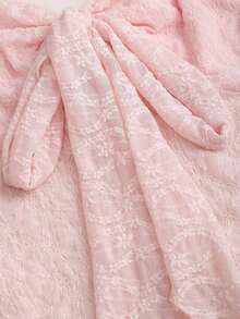 Top tubo corto con estampado texturizado y lazo - Rosa - Ver 5