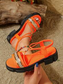 Sandal đế xuồng hở mũi cho nữ, nhẹ, chống trơn trượt, quai đính kim tuyến, kiểu dáng đi biển, nghỉ mát. - trái cam - Xem 1