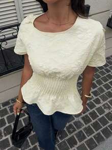 Elegante blusa de verano con textura floral, de color crema apricot, para mujer. Apta para uso casual en el trabajo, fiestas y eventos. Camisa con espalda anudada y cintura fruncida, de manga corta y diseño jacquard, con estilo y elegancia. - Albaricoque - Ver 5