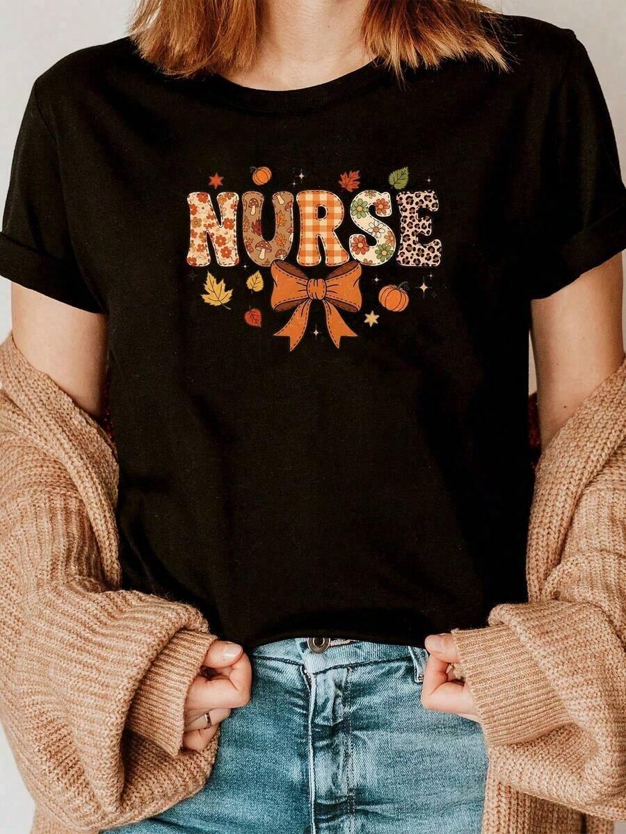 Camiseta Gráfica de Enfermera - Diseño de Calabaza Otoñal con Lazo en Negro, Camiseta Transpirable para Enfermeras, Adecuada para Mujeres y Hombres, Ropa de Trabajo Médico, Regalo para Trabajadores Médicos, Camiseta Casual para el Otoño, Día de Acción de Gracias, Halloween - Regalo Ideal para Enfermeras, Accesorios para Enfermeras, Ropa Temática de Enfermería, Ajuste Cómodo, Camiseta de Trabajo, Camiseta de Cuello Redondo, Material Ligero, Camiseta de Manga Corta, Regalo para Enfermeras, Transpirable y Cómoda. - Negro - Ver 1