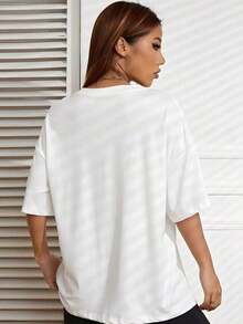 Envío gratis, entrega local enéxico, entrega en 4 días. Nueva camisa de mujer para otoño-invierno, de manga corta con cuello redondo, como prenda básica.Con diseño holgado y estampado moderno, hecha de algodón de alta calidad, ofrece comodidad y una sensación agradable en tu día a día. - Blanco - Ver 2