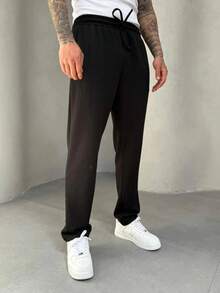 Pantalón casual de ajuste relajado con cordón para hombres - Negro - Ver 3