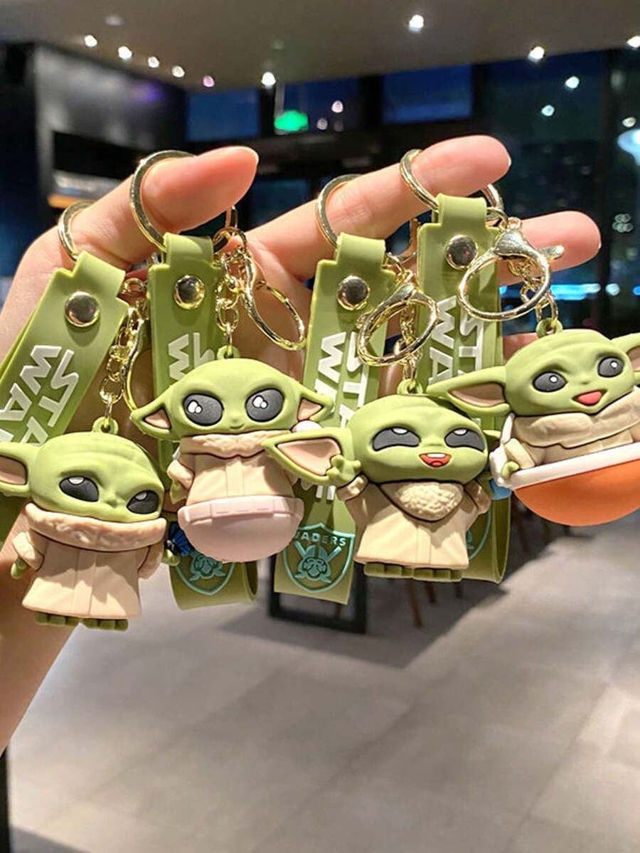 Hasbro Grogu 3D Silicone Keychain, Featuring Cute, Detailed Grogu Figures In Varied Poses With Soft, Smooth Texture. Each Keychain Comes With A Sturdy Metal Ring, Clip, And Branded Silicone Strap, Making It Durable And Easy To Attach To Bags, Keys, Or Accessories. Ideal For Fans, These Whimsical, Lightweight Charms Add A Playful, Collectible Touch To Everyday Carry Items. - Silver-2pcs - View 1