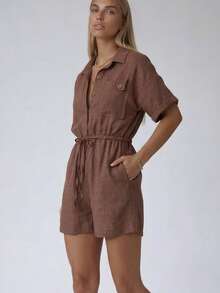 Women's Short Sleeve Romper With A Collared Neckline, Button-Front Closure, Chest Pocket, And Adjustable Drawstring Waist. Designed In A Lightweight Woven Fabric For A Comfortable And Versatile Everyday Look. - Mocha Brown - View 3
