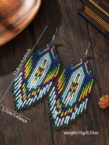 SOUL BEADING أقراط مصنوعة يدويًا بخيوط بوهيمية ثقيلة الصناعة مزينة بخرز الأرز، ذات تباين لوني تدرجي وشرابات طويلة، تناسب أجواء الأعياد والمهرجانات الموسيقية - متعدد الألوان - مشاهدة 5