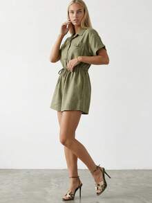 Women's Short Sleeve Romper With A Collared Neckline, Button-Front Closure, Chest Pocket, And Adjustable Drawstring Waist. Designed In A Lightweight Woven Fabric For A Comfortable And Versatile Everyday Look. - Khaki - View 2