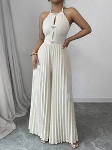 Elegante mono de mujer con cuello de halter, lazo delantero con piedras de cristal, plisado y piernas anchas en color albaricoque - Albaricoque - Ver 7