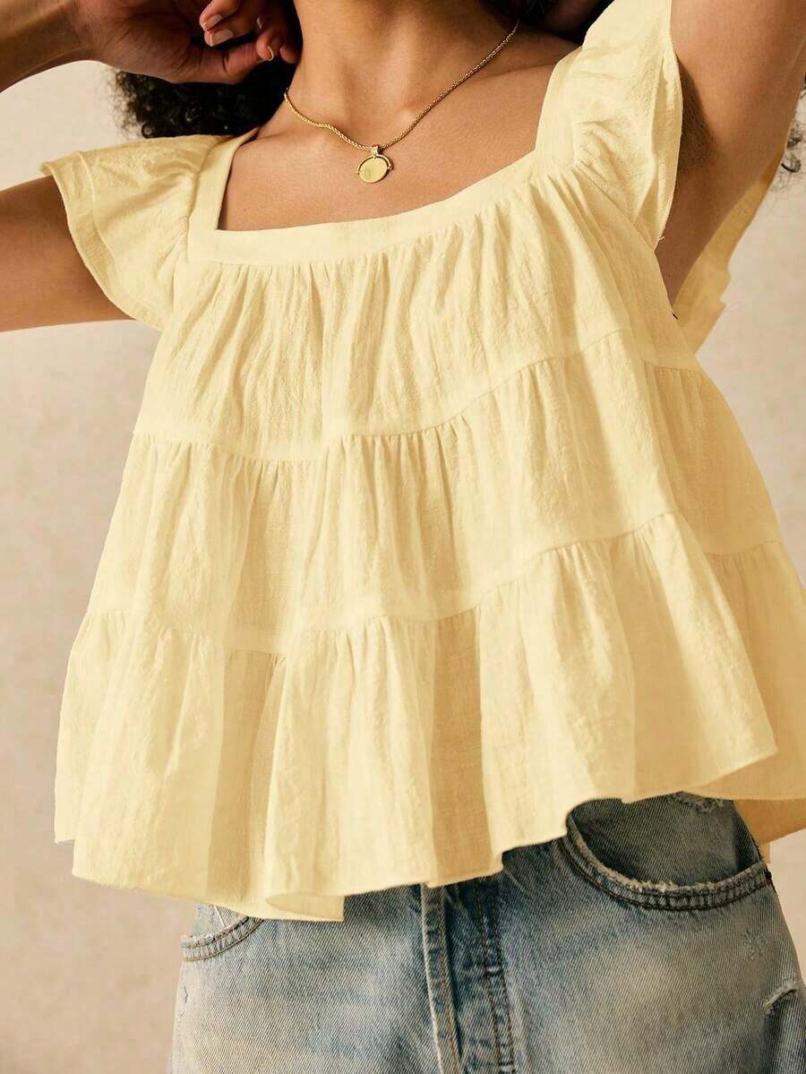 Blusa informal de mujer con volantes en el borde de unicolor - Amarillo claro - Ver 1
