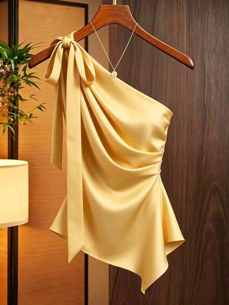Blusa asimétrica de satén color caramelo con lazo en el hombro, diseño ajustado con pliegues asimétricos, adecuada para citas, ir al trabajo, con hombro sexy en capas, camisa elegante y de moda - Amarillo - Ver 1