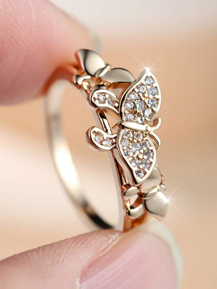 1 eleganter und exquisiter Damenring mit kubischen Zirkoniasteinen in Schmetterlings-Design - perfekt als einzigartiges Schmuckstück oder Modeaccessoire für Frauen, oder als Geburtstagsgeschenk oder Alltagsaccessoire für sie - Goldgelb - Übersicht 1