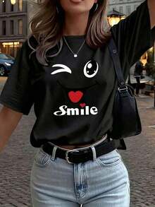 Camiseta de mujer de manga corta con cuello redondo y estampado de dibujos animados, en color blanco, camiseta gráfica, adecuada para looks de verano, otoño e invierno, color negro100% Cotton - Negro - Ver 1
