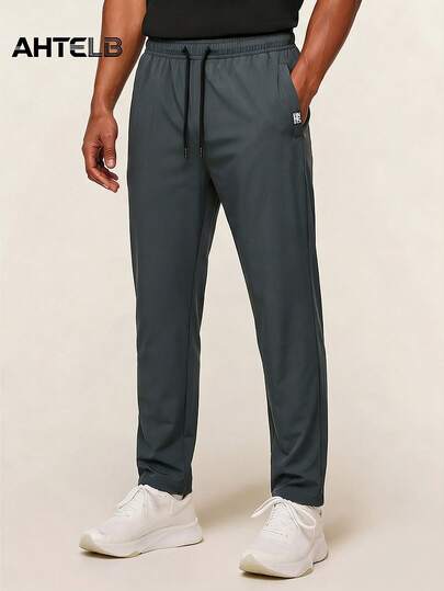  AHTELB Men's Lightweight Ice Silk Breathable Elastic Jogger Pants With Zipper Pockets And Drawstring Waist, Soft And Comfortable Ice Silk Fabric, Solid Color Sweat-Wicking Straight Leg Pants, Suitable For Casual, Outdoor, Workout, Vacation, Fishing, Gym Wear