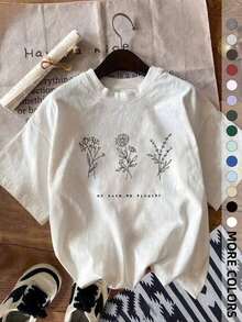 Camiseta con Estampado Gráfico de Flores Silvestres "No Rain No Flowers", Camiseta Minimalista con Arte Botánico Lineal, Camiseta Oversize [% Algodón], Top Casual de Manga Corta con Estampado Floral Bohemio, Camiseta Vintage Minimalista de Algodón para Uso Diario y Regalos para Amantes de las Plantas - Blanco - Ver 1