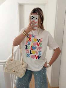 Camiseta Oversize para Mujer con Estampado de Letras y Corazones, Cuello Redondo, Manga Corta, Diseño Casual - Negro - Ver 9