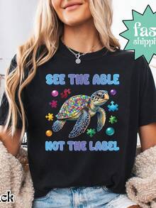 Camiseta See The Able Not The Label, Camiseta de Concienciación sobre el Autismo, Camiseta de Tortuga con Pieza de Rompecabezas, Camiseta Neurodrgent, Camiseta de Salud Mental. Camiseta unisex de algodón puro de 220 g. Peso ideal para todas las estaciones, apta para hombres y mujeres. Tejido duradero de alta calidad, suave al tacto y de larga duración. Top transpirable. Adecuado para la primavera y el verano de las mujeres, vacaciones, Día de la Madre, Día de la Independencia. - Negro - Ver 1