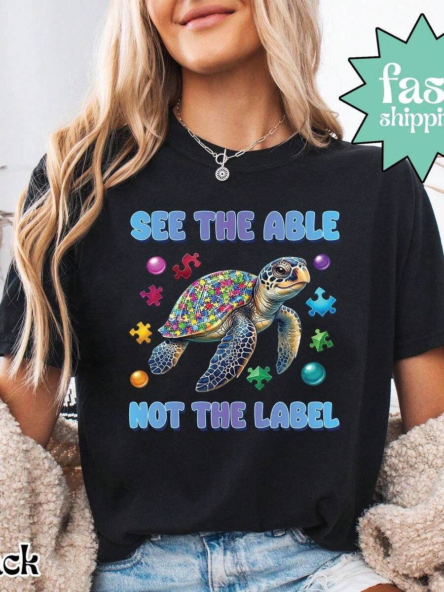 Camiseta See The Able Not The Label, Camiseta de Concienciación sobre el Autismo, Camiseta de Tortuga con Pieza de Rompecabezas, Camiseta Neurodrgent, Camiseta de Salud Mental. Camiseta unisex de algodón puro de 220 g. Peso ideal para todas las estaciones, apta para hombres y mujeres. Tejido duradero de alta calidad, suave al tacto y de larga duración. Top transpirable. Adecuado para la primavera y el verano de las mujeres, vacaciones, Día de la Madre, Día de la Independencia. - Negro - Ver 1