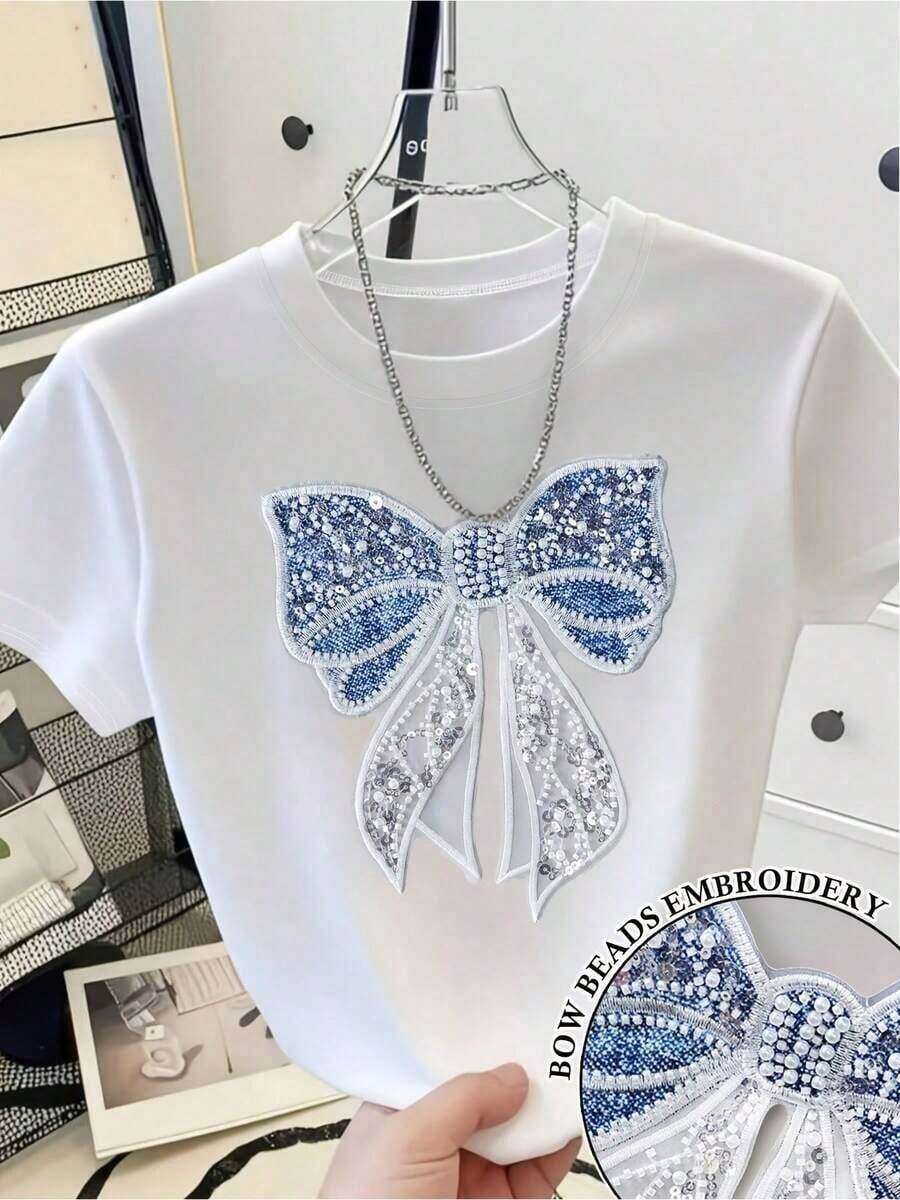 Plus Size Vintage Loose Fit T-Shirt With Embroidered Applique Print - Women's Spring/Summer Fashion, Unique, Sweet And Youthful Design, 3D Print With Pearl And Sequin Bow, Round Neck, Short Sleeve, Casual Loose Fit T-Shirt, Versatile For Everyday Wear, Flat Heat Transfer Printing With 3D Effect And For Dates, Urban Style For Daily Use, Machine Washable, Flat Heat Transfer Printing And Stamping With 3D Effects. - 白色 - 查看 1