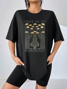 Figure Of A Girl Looking Towards A Magical Garden Full Of Golden Flowers That Evoke A Journey To Fantasy And Freedom, Inspiring Dreams And Serenity. Comfortable And Soft Women's T-Shirt For Everyday Use - 黑色 - 查看 1