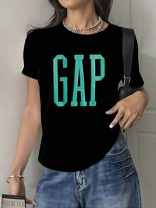 Grandes letras verdes que representan energía confianza y actitud positiva en un fondo oscuro moderno camiseta de mujer casual cómoda para uso diario - Negro - Ver 1