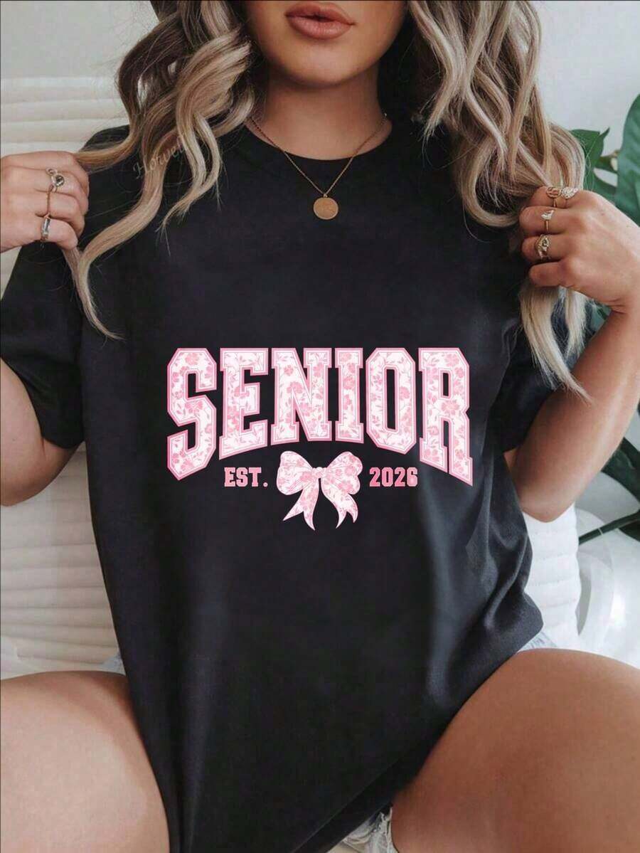 Camiseta Casual de Manga Corta para Mujer - Estilo Senior Est 2026, Estampado de Lazo Rosa, Cuello Redondo, Top de Verano, Lavable a Máquina, Camisetas para Damas, Ropa Casual, Aspecto Moderno, Ajuste Cómodo
-Blanco - Negro - Ver 1