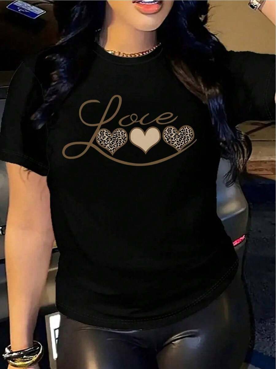 YOCASA Camiseta informal de verano para mujer, de cuello redondo, ajustada y manga corta, con estampado de pintura al óleo, floral, de corazones, de cerezas y de letras. Tejido informal sencillo, estilo deportivo, ideal para el día a día y para una cita de San Valentín. - Negro - Ver 1