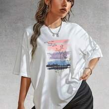 Camiseta de algodón de manga corta estilo americano, holgada y versátil, con estampado floral de verano, cuello redondo, top casual de corte holgado. - Negro - Ver 2