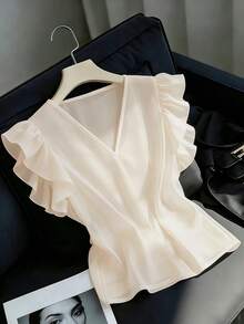 2026 Verão Elegante Novo Estilo Francês Suave Camisa de Cor Sólida com Decote em V para Senhoras, Versão Solta, Design de Manga Voadora Flutuante, Um Estilo Versátil para Uso Diário. - Damasco - Visão 1