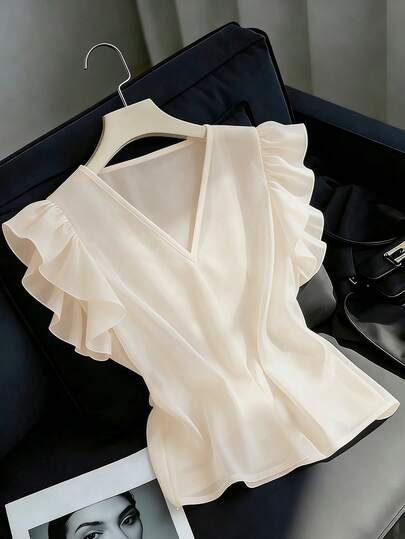 2026 Verano Elegante Nuevo Estilo Francés Suave para Damas Camisa de unicolor con Cuello en V, Versión Holgada, Diseño de Mangas Voladoras, Un Estilo Versátil para Ir y Venir.