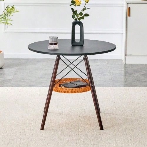 A Round Dining Table With A Diameter Of 80 Cm, A Tabletop Made Of Black MDF And Table Legs Made Of Walnut-Colored Solid Wood, Complemented By A Floating, Woven Storage Compartment. - Walnut+Black - View 1