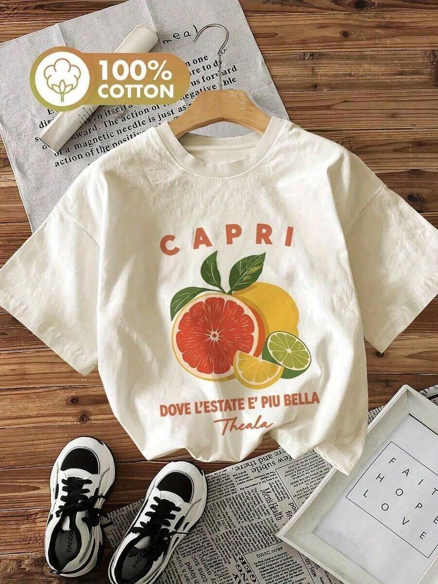 Camiseta Casual de Manga Corta con Cuello Redondo para Mujer Solt - 100% Algodón, Estampado de "CAPRI" y Cítricos, Negra con Detalles Naranjas, Transpirable, Ideal para Primavera y Verano, Lavable a Máquina, Camisetas para Mujer, Corte Relajado, Tela Suave, Ropa de Invierno para Mujer, Camiseta de Manga Corta con Estampado de Letras, Casual, Oversize, para Uso Diario y al Aire Libre. gráfico - Albaricoque - Ver 1