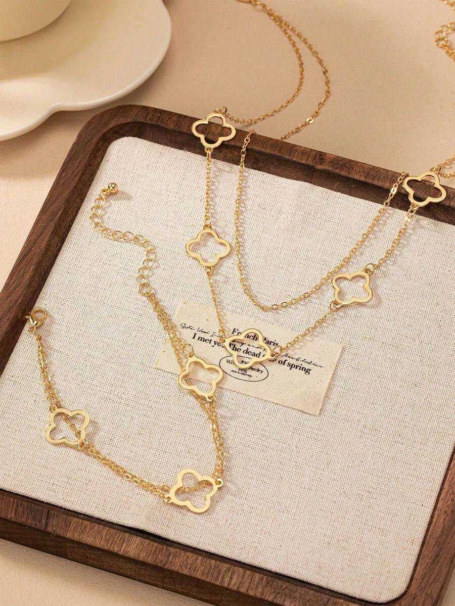 Bộ 2 món dây chuyền và vòng tay kim loại mặt dây chuyền hình cỏ bốn lá rỗng tối giản thời trang, phù hợp cho các cô gái tuổi teen mặc hàng ngày, dự tiệc và lễ hội. - Vàng - Xem 1