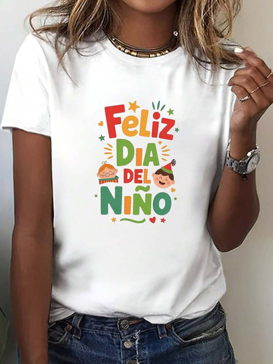 Camiseta gráfica de mujer en español "Feliz Día del Niño" - Top casual de manga corta y cuello redondo con diseño divertido de estrellas y confeti, camiseta elástica media lavable a máquina para verano y primavera, camisetas para damas, diseño vibrante para niñas, camisa de ajuste cómodo - Blanco - Ver 1