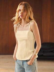 Camiseta sin mangas de verano para mujer, con un diseño de unicolor minimalista y cintura ceñida para una silueta favorecedora.Elegante pero sencilla, adecuada para ocasiones formales como conciertos y actuaciones, así como para un uso casual - Albaricoque - Ver 3
