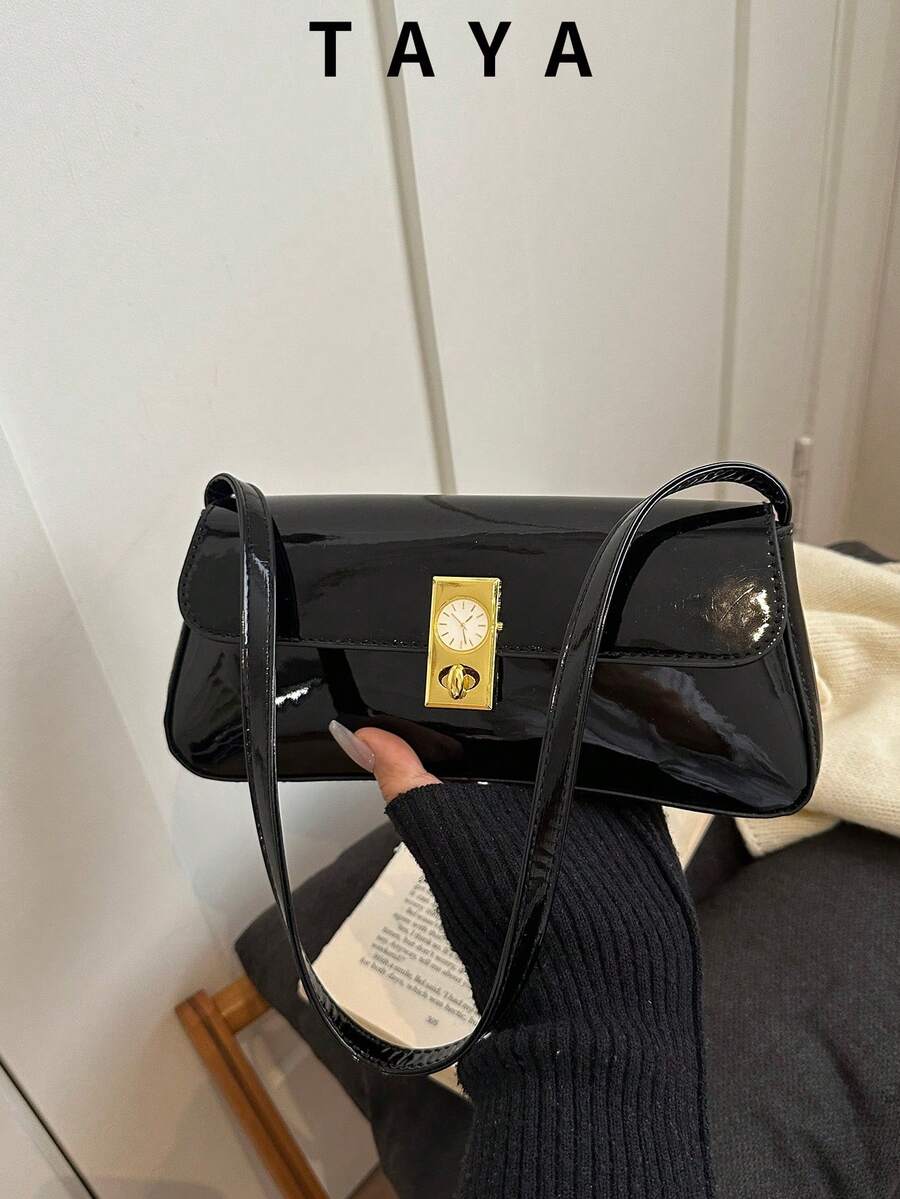 时尚简约休闲PU皮腋下包。适合购物、装钱包，也适合学生、年轻女性和职业女性使用。是办公室、学校、工作、商务、通勤、户外活动、旅行和野餐的理想之选。
