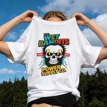 Ropa de verano para mujer, camiseta de algodón suave y casual con cuello redondo, estampado de calaveras, ojos y rayos de THE WET BANDITS POWER SUPPLY CO. Color blanco. - Blanco - Ver 1