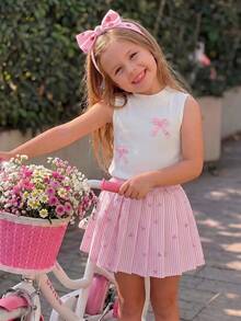 Conjunto de 2 piezas de top de punto acanalado de cuello en V blanco + falda con estampado de lazo a rayas verticales para niñas, adecuado para uso diario, actividades al aire libre y eventos, primavera/verano - Rosa - Ver 3