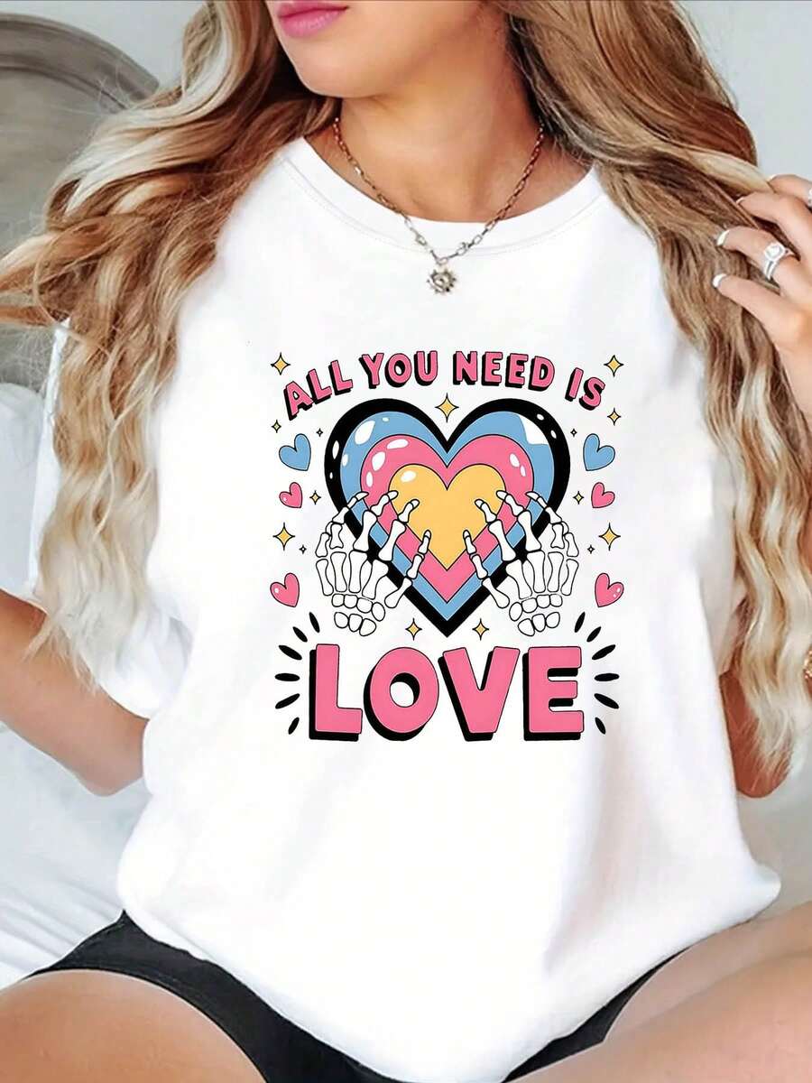 Talla - Talla - Un estilo romántico con un moderno, esta camiseta oversized de cuello redondo para mujer presenta un estampado de calavera sosteniendo una mano con un corazón, perfecta para el uso diario, compras y reuniones en primavera y verano - Blanco - Ver 1