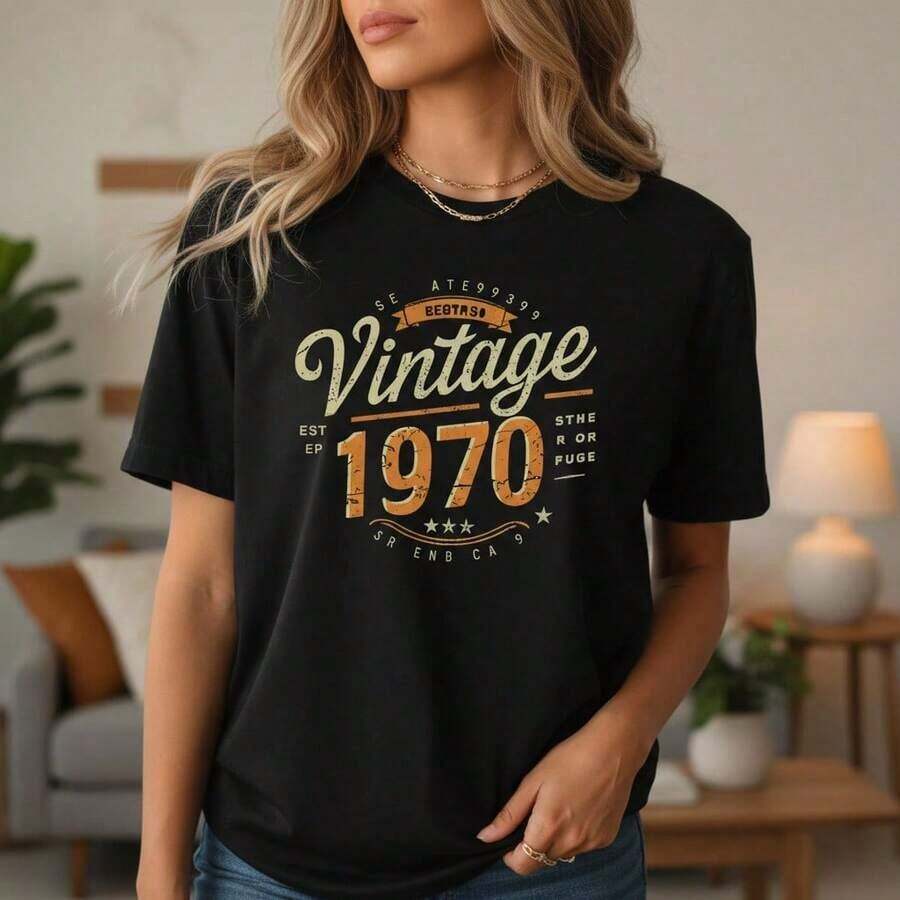 Camiseta de Algodón Vintage para Mujer con Estampado Gráfico de los 70, Camiseta Casual de Manga Corta con Cuello Redondo, Top Básico de Corte Holgado para Uso Diario, Tallas Disponibles, Camiseta Casual Negra con Estampado de Letras Retro para Mujer. - Negro - Ver 1