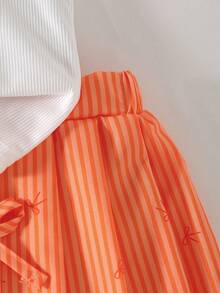 Conjunto de 2 piezas de top de punto acanalado de cuello en V blanco + falda con estampado de lazo a rayas verticales para niñas, adecuado para uso diario, actividades al aire libre y diversas ocasiones, primavera/verano - Naranja - Ver 3