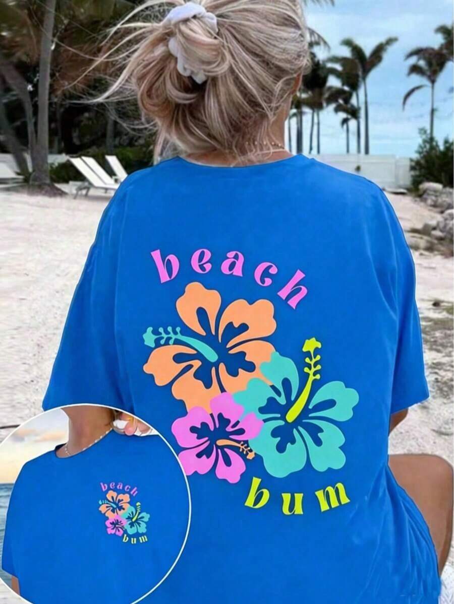Vintage [Camiseta de Playa con Estampado Floral] Camiseta de Talla Grande para Mujer con Estampado Floral y Hombros Caídos | Camiseta casual de manga corta con cuello redondo y diseño "Beach Bum" - Tela pura, cómoda y transpirable para primavera y verano, camiseta de corte holgado, textura suave, estilo urbano, unisex, para primavera/verano/otoño, atuendo para el Día de San Valentín, atuendos de verano, Día de la Madre, camisas, camisas para mujer, playeras, playeras de mujer, vintage, atuendo de Pascua para mujer, tops de talla grande para el Día de la Madre en fiestas, moda.