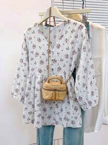 Blusa de mujer con cuello en V de gasa con estampado floral romántico, manga farol, corte holgado y silueta favorecedora, adecuada para uso casual, de calle y de oficina en vacaciones de verano - Celeste - Ver 1